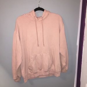 A pink sweater